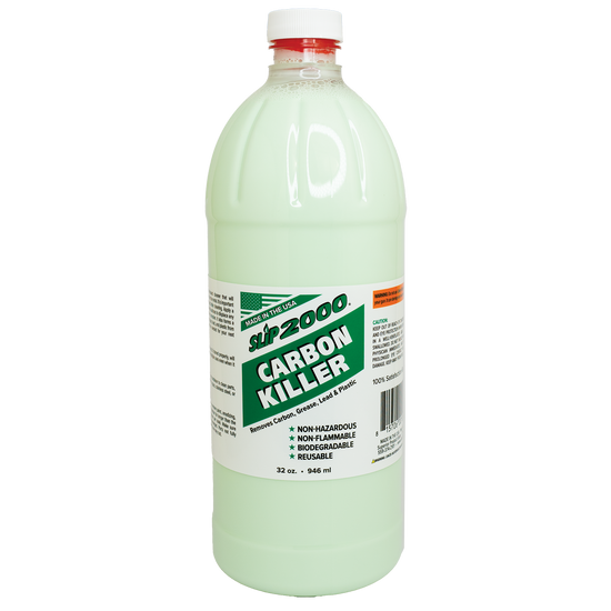 Large clear 32oz bottle of green Slip 2000 Carbon Killer with a white and green label