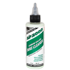 small clear 4oz bottle of green Slip 2000 Carbon Killer with a white and green label