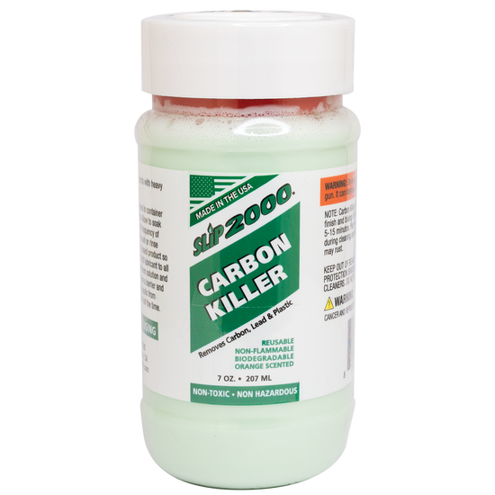 Small 7oz jar of green Slip 2000 Carbon Killer with a white and green label